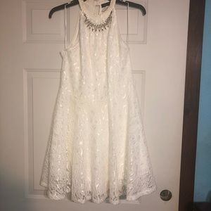 Short, lace, white dress with attached necklace